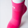 Bas Court Rose Avec Logo Blanc