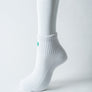 Bas Court Blanc Avec Logo Vert