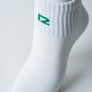 Bas Court Blanc Avec Logo Vert