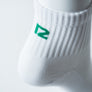 Bas Court Blanc Avec Logo Vert
